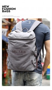 Холщовый рюкзак Muzee ME_1189 серый, надетый на мужчину