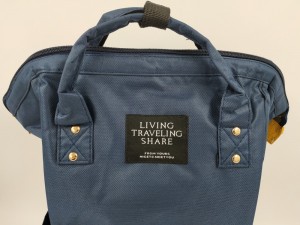 Рюкзак LIVING TRAVELING SHARE 008 темно-синий фото лого крупным планом